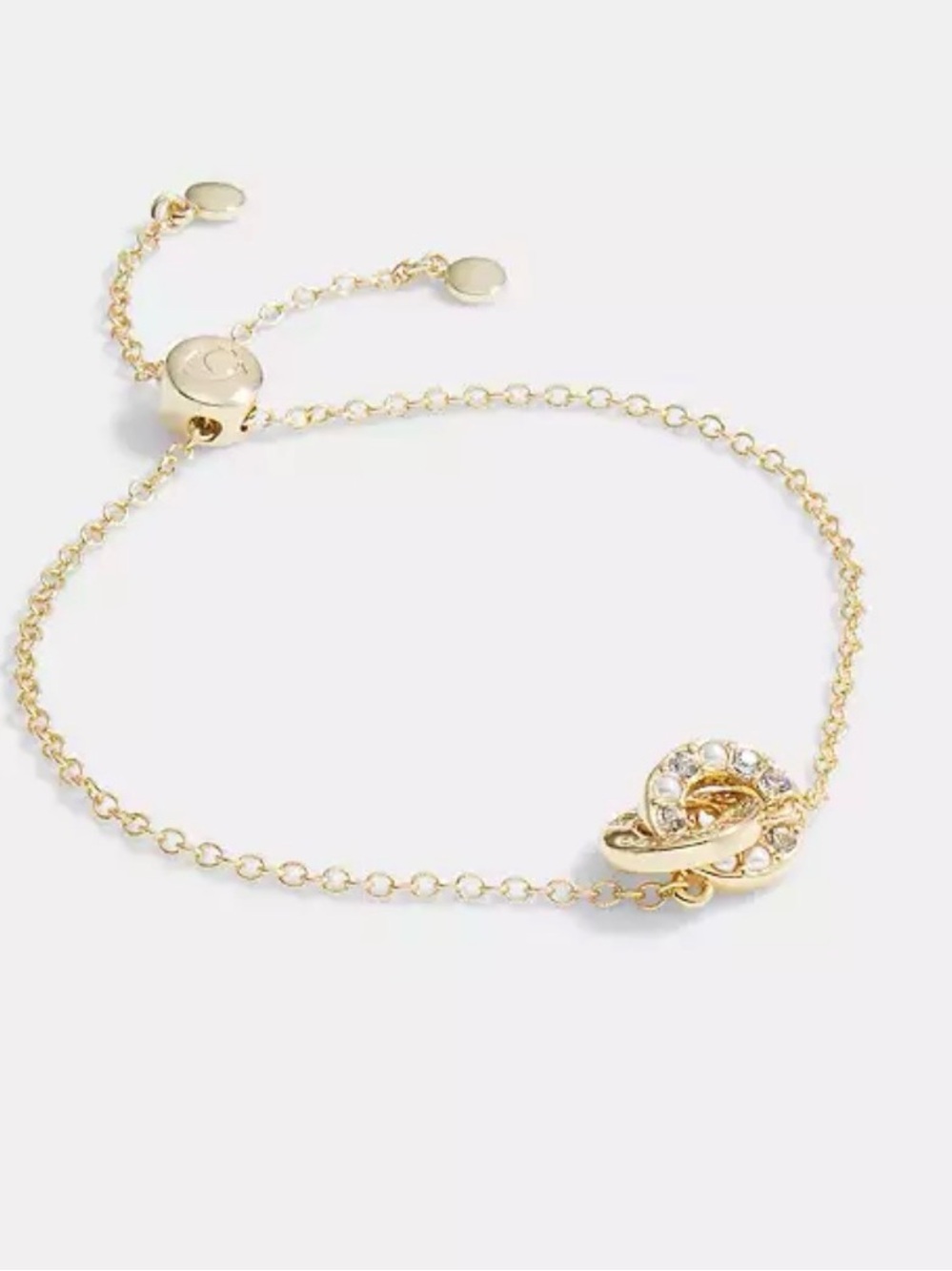 Coach Gold-Tone Knot Bracelet with Crystal Accents